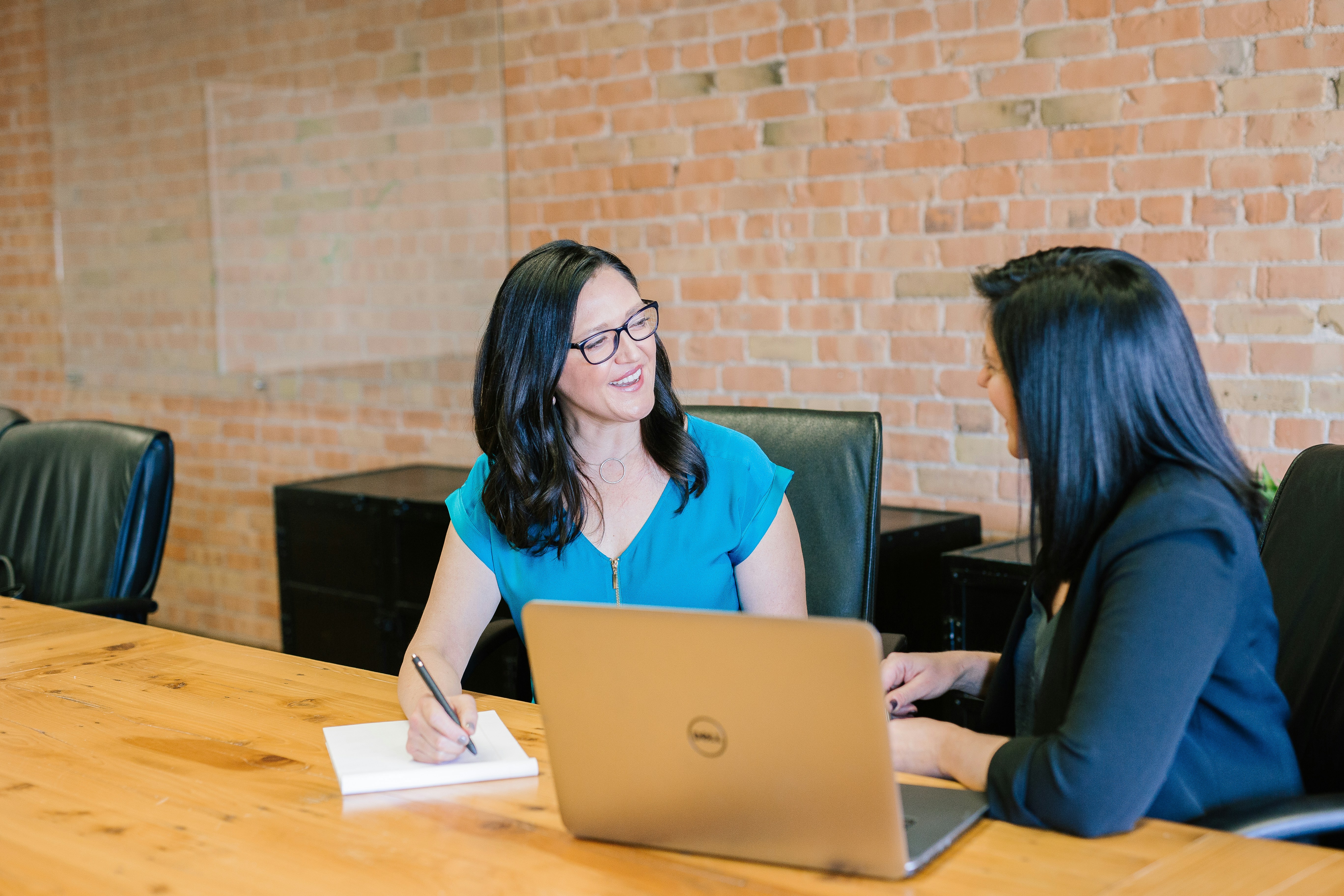 Financial advisor reviewing wealth plans with a client
