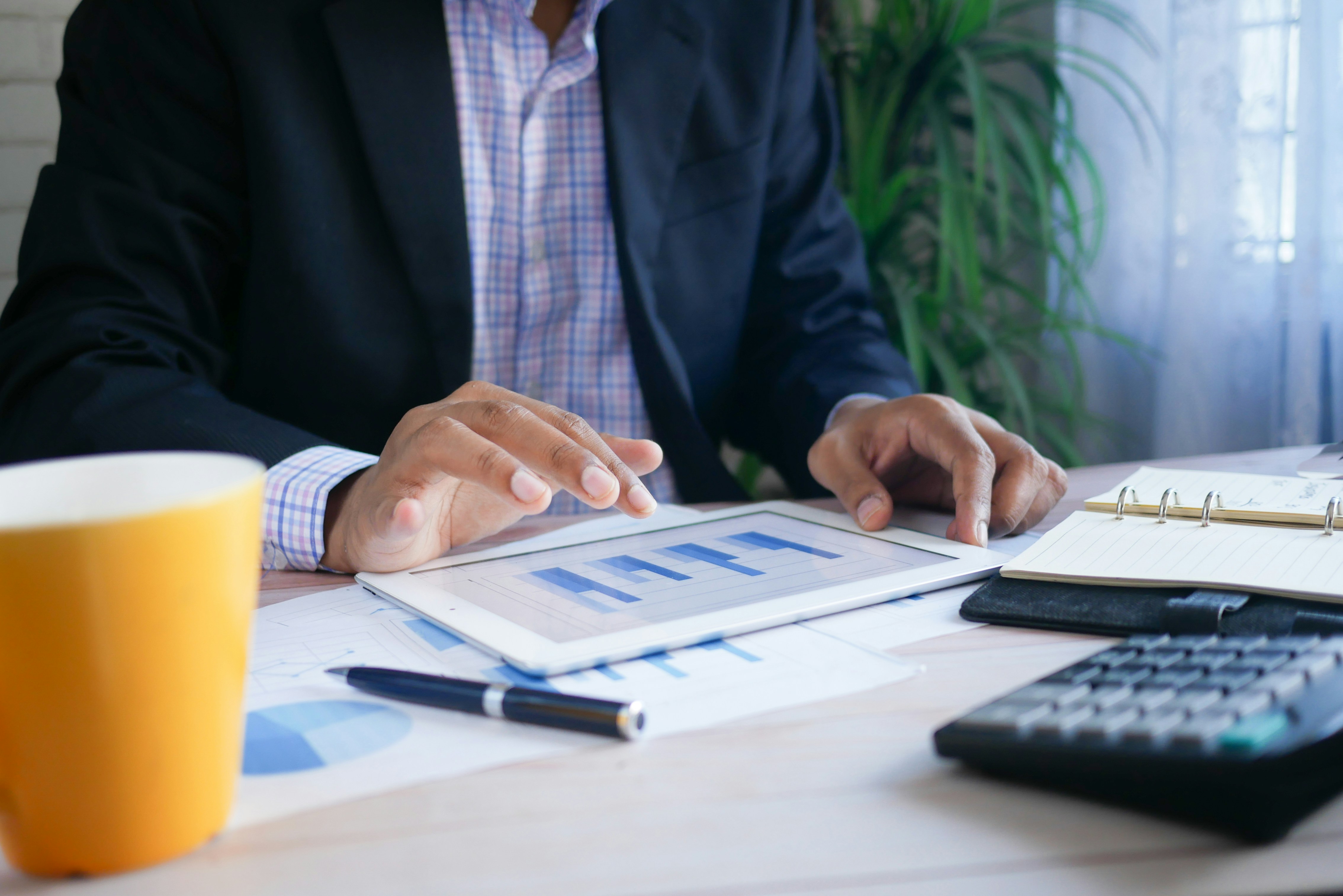 Reviewing financial planning data on a tablet